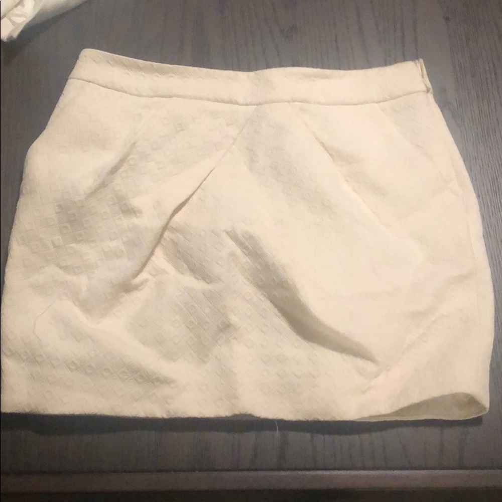 Beige patterned mini skirt